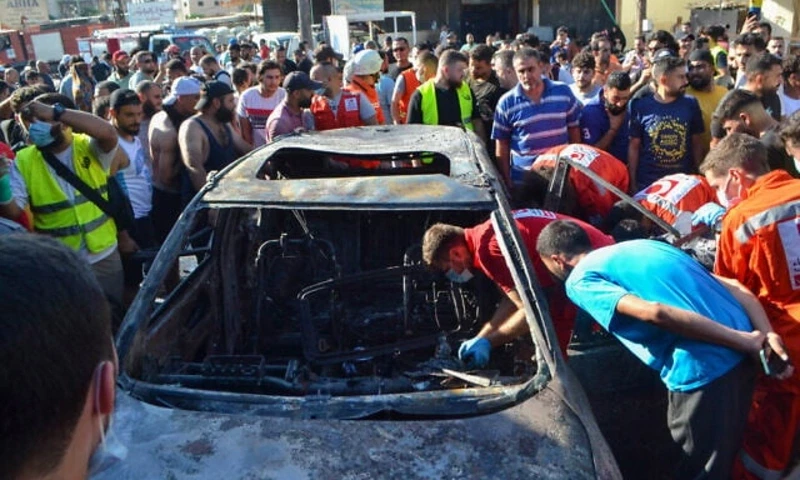 Paramedics inspect a burned vehicle that was targeted in an Israeli airstrike, in the Ayrouniyeh area near Lebanon’s northern port city of Tripoli, July 8 Paramedics inspect a burned vehicle that was targeted in an Israeli airstrike, in the Ayrouniyeh area near Lebanon’s northern port city of Tripoli, July 8