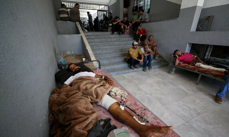 Wounded Palestinians lie on beds at Al Shifa Hospital in Gaza City. – Reuters Wounded Palestinians lie on beds at Al Shifa Hospital in Gaza City. – Reuters