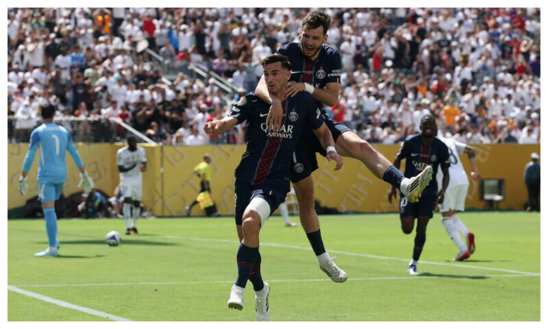 Soccer Football - FIFA Club World Cup - Semi Final - Paris St Germain v Real Madrid - MetLife Stadium, East Rutherford, New Jersey, U.S. - July 9, 2025 Paris St Germain’s Fabian Ruiz celebrates scoring their first goal with Khvicha Kvaratskhelia REUTERS