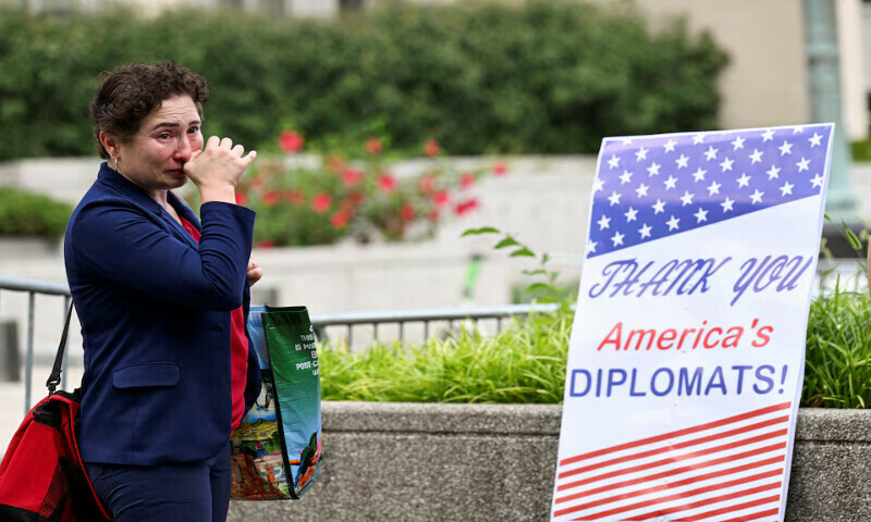 A woman cries during a sendoff event for US State Department workers in Washington, DC. – Reuters A woman cries during a sendoff event for US State Department workers in Washington, DC. – Reuters