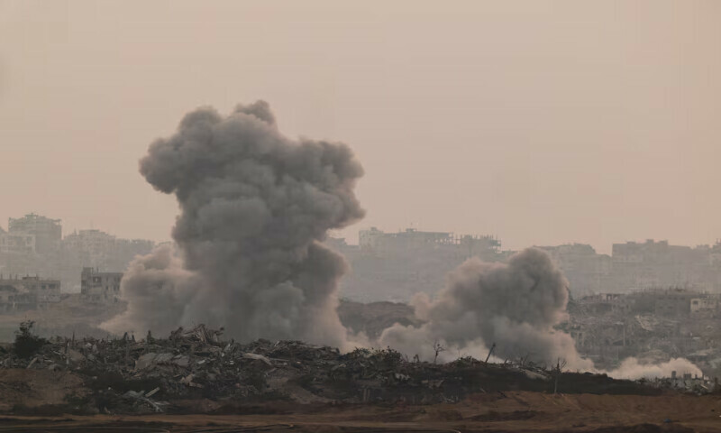 Smoke rises from Gaza after an explosion. – Reuters