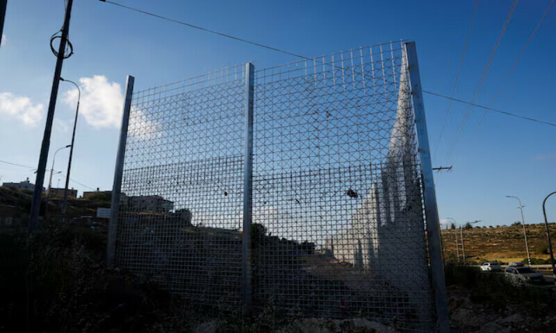 A view shows a part of the fence, which was set by the Israeli authorities, in Sinjil, near Ramallah, in the Israeli-occupied West Bank. – Reuters