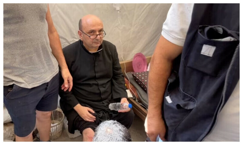 Parish priest of the Church of the Holy Family, father Gabriele Romanelli, receives medical attention, after he suffered light leg injuries following an Israeli strike on the church, according to medics, at Al-Ahli Arab Hospital in Gaza City, in this still image taken from a video July 17, 2025. REUTERS Parish priest of the Church of the Holy Family, father Gabriele Romanelli, receives medical attention, after he suffered light leg injuries following an Israeli strike on the church, according to medics, at Al-Ahli Arab Hospital in Gaza City, in this still image taken from a video July 17, 2025. REUTERS