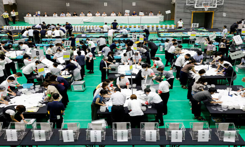 Election officials count votes at a ballot counting centre for Japan’s upper house election in Tokyo, Japan, on Sunday. – Reuters Election officials count votes at a ballot counting centre for Japan’s upper house election in Tokyo, Japan, on Sunday. – Reuters