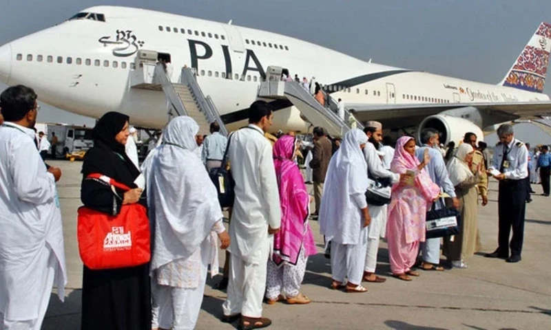 Passengers are standing in queue to board a PIA plane.  — APP/File Passengers are standing in queue to board a PIA plane.  — APP/File