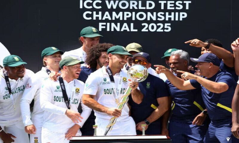 June 14, 2025 South Africa’s David Bedingham celebrates with the ICC Test Championship Mace on the podium alongside teammates after winning the final Action Images via Reuters