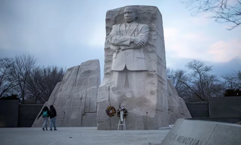 People walk by the Martin Luther King, Jr. Memorial, ahead of the presidential inauguration of U.S. President-elect Donald Trump, in Washington, U.S., January 16, 2025. REUTERS People walk by the Martin Luther King, Jr. Memorial, ahead of the presidential inauguration of U.S. President-elect Donald Trump, in Washington, U.S., January 16, 2025. REUTERS