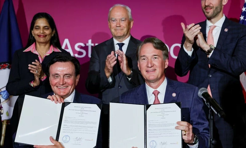 AstraZeneca CEO Pascal Soriot and Virginia Governor Glenn Youngkin show documents related to a manufacturing site investment after signing them during an event at the Meridian International Center, in Washington, DC. Photo: Reuters AstraZeneca CEO Pascal Soriot and Virginia Governor Glenn Youngkin show documents related to a manufacturing site investment after signing them during an event at the Meridian International Center, in Washington, DC. Photo: Reuters