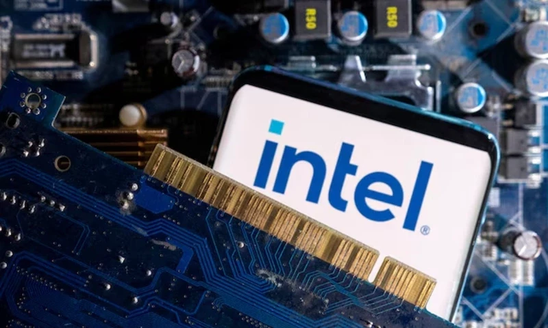 A smartphone with a displayed Intel logo is placed on a computer motherboard in this illustration created on March 6, 2023. REUTERS A smartphone with a displayed Intel logo is placed on a computer motherboard in this illustration created on March 6, 2023. REUTERS