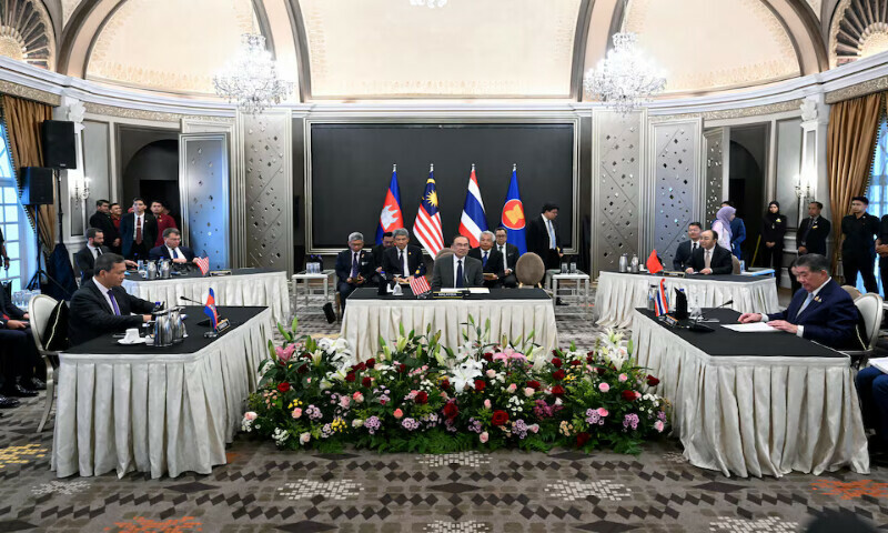 Malaysia’s Prime Minister Anwar Ibrahim looks on as Cambodia’s Prime Minister Hun Manet and Thailand’s acting Prime Minister Phumtham Wechayachai take part in mediation talks on the Thailand–Cambodia border conflict, in Putrajaya, Malaysia, on Monday. – Reuters