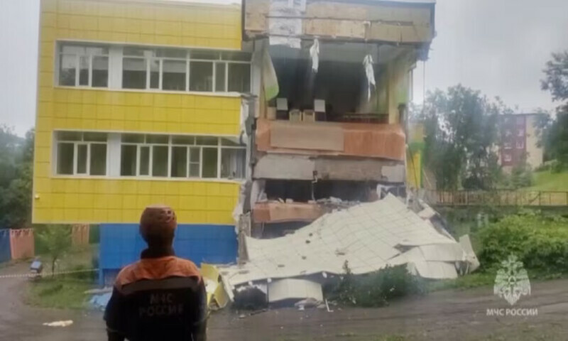 An emergency services worker looks at a kindergarten damaged by an earthquake in Petropavlovsk-Kamchatsky, Kamchatka Krai, Russia, on Wednesday. – Reuters