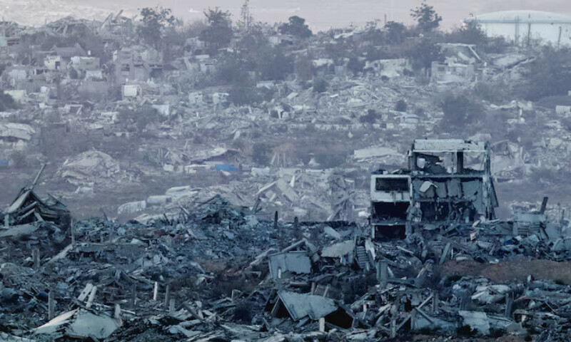 A view of buildings destroyed in Israli attacks in Gaza, as seen from the Israeli side of the border. – Reuters