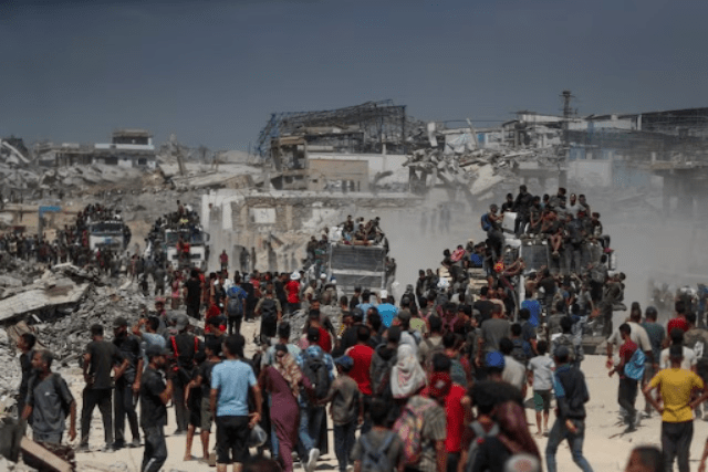 Palestinians climb onto trucks as they seek for aid supplies that entered Gaza through Israel in Beit Lahia, northern Gaza Strip, on August 1, 2025. Reuters Palestinians climb onto trucks as they seek for aid supplies that entered Gaza through Israel in Beit Lahia, northern Gaza Strip, on August 1, 2025. Reuters