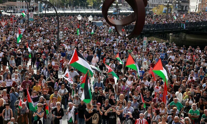 People hold flags during a demonstration in support of Palestinians, orgsanised by Palestinarekin Elkartasuna (Solidarity With Palestine), in Bilbao, Spain, on October 5, 2024. Reuters file photo People hold flags during a demonstration in support of Palestinians, orgsanised by Palestinarekin Elkartasuna (Solidarity With Palestine), in Bilbao, Spain, on October 5, 2024. Reuters file photo