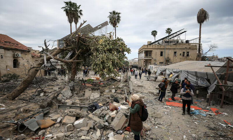 Palestinians inspect the damage after two Israeli missiles hit a building inside the Al Ahli Arab Baptist Hospital in Gaza City. – Reuters file Palestinians inspect the damage after two Israeli missiles hit a building inside the Al Ahli Arab Baptist Hospital in Gaza City. – Reuters file