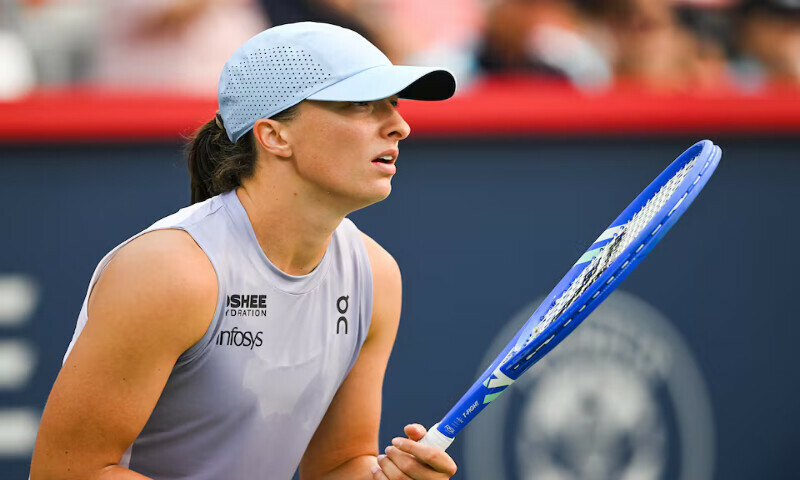 Iga Swiatek waits for Clara Tauson to serve the ball in fourth round play at IGA Stadium. 00 Reuters Iga Swiatek waits for Clara Tauson to serve the ball in fourth round play at IGA Stadium. 00 Reuters