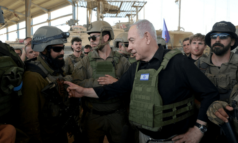 Israeli Prime Minister Benjamin Netanyahu visits Israeli soldiers in Rafah, in the southern Gaza Strip, in this handout picture from July 18, 2024. Reuters file Israeli Prime Minister Benjamin Netanyahu visits Israeli soldiers in Rafah, in the southern Gaza Strip, in this handout picture from July 18, 2024. Reuters file