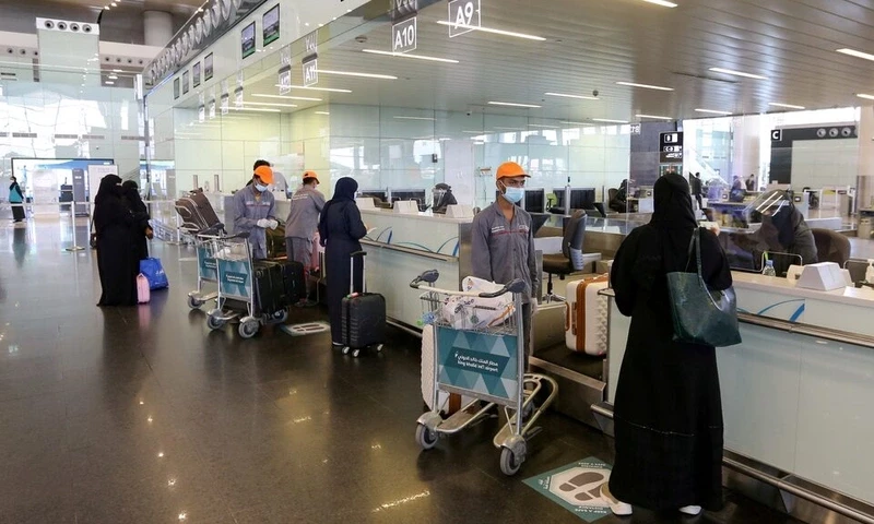 Passengers talk to airline employees at Riyadh International Airport, after Saudi Arabia reopened domestic flights, following the outbreak of the coronavirus disease (COVID-19), in Riyadh, Saudi Arabia May 31, 2020. REUTERS Passengers talk to airline employees at Riyadh International Airport, after Saudi Arabia reopened domestic flights, following the outbreak of the coronavirus disease (COVID-19), in Riyadh, Saudi Arabia May 31, 2020. REUTERS