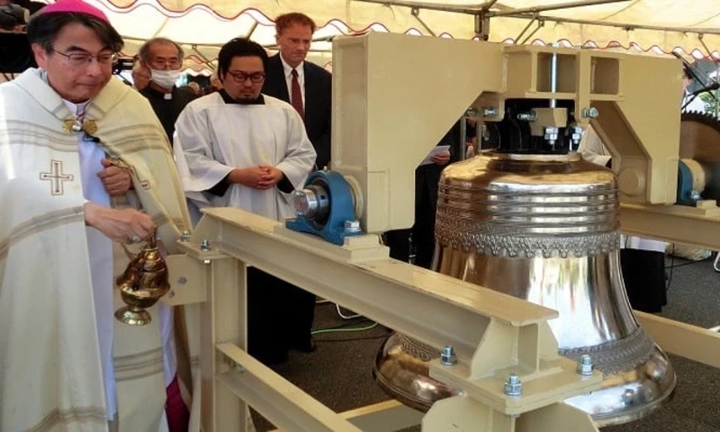 Archbishop Michiaki Nakamura blesses the newly donated “Bell of Saint Kateri of Hope” during a ceremony at Urakami Church on July 17, 2025. — Archdiocese of Nagasaki Archbishop Michiaki Nakamura blesses the newly donated “Bell of Saint Kateri of Hope” during a ceremony at Urakami Church on July 17, 2025. — Archdiocese of Nagasaki