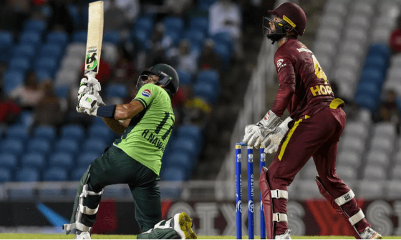 Pakistan’s Hasan Nawaz hits six as West Indies captain Shai Hope watches in Pakistan’s five-wicket ODI triumph over the West Indies. – AFP