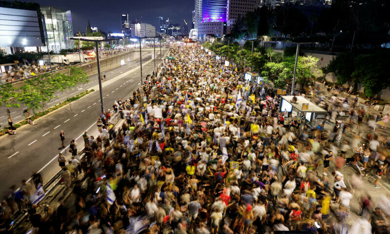 Demonstrators attend a protest demanding the immediate release of the hostages and the end of the Gaza war, in Tel Aviv, Israel. – Reuters Demonstrators attend a protest demanding the immediate release of the hostages and the end of the Gaza war, in Tel Aviv, Israel. – Reuters