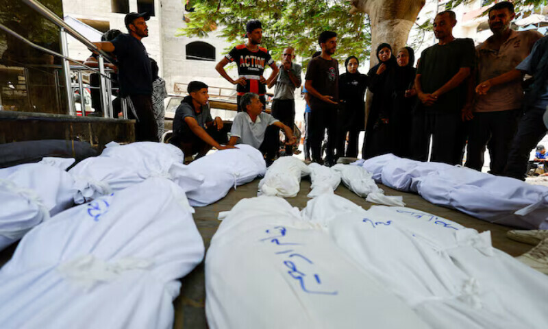 Mourners react during the funeral of Palestinians from the Irheem family who were killed in an Israeli strike in Gaza City on Monday. – Reuters Mourners react during the funeral of Palestinians from the Irheem family who were killed in an Israeli strike in Gaza City on Monday. – Reuters