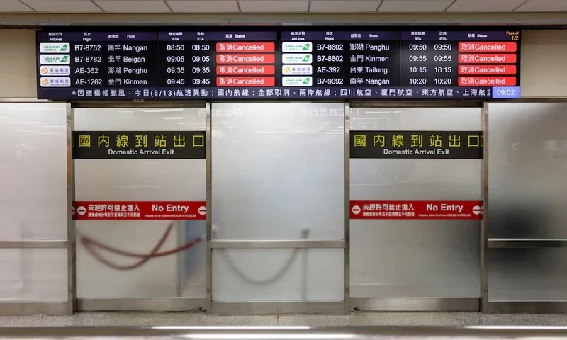 A screen displays information on cancelled domestic flights, as Typhoon Podul approaches the country, in Taipei, Taiwan August 13, 2025. REUTERS A screen displays information on cancelled domestic flights, as Typhoon Podul approaches the country, in Taipei, Taiwan August 13, 2025. REUTERS