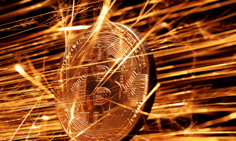 Sparks strike representation of cryptocurrency Bitcoin in this illustration taken on November 24, 2024. Reuters file Sparks strike representation of cryptocurrency Bitcoin in this illustration taken on November 24, 2024. Reuters file