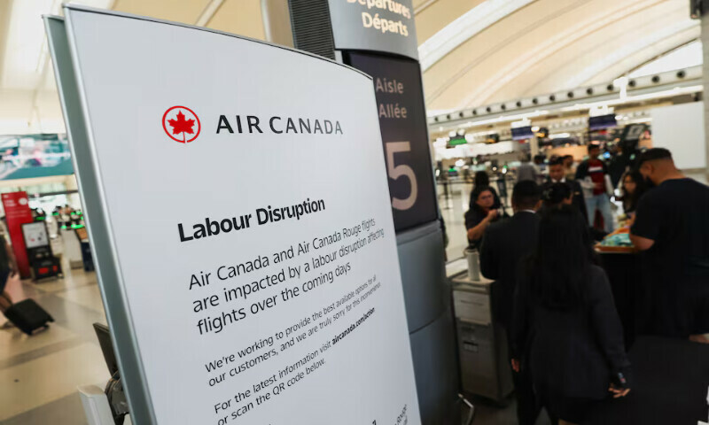 Air Canada workers assist a passenger at a kiosk while handling flight disruptions, ahead of a strike by the airline’s flight attendants, at Toronto Pearson International Airport in Mississauga, Ontario, Canada. – Reuters Air Canada workers assist a passenger at a kiosk while handling flight disruptions, ahead of a strike by the airline’s flight attendants, at Toronto Pearson International Airport in Mississauga, Ontario, Canada. – Reuters
