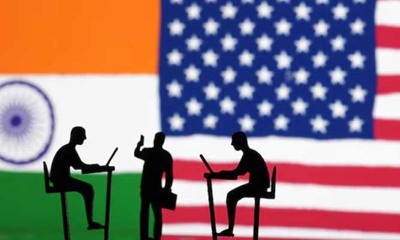 The Indian flag, the US flag and people miniatures, some with laptops, are seen in this illustration taken March 10, 2024. — Reuters The Indian flag, the US flag and people miniatures, some with laptops, are seen in this illustration taken March 10, 2024. — Reuters