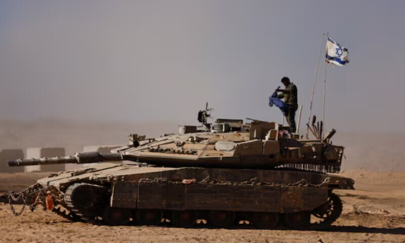 An Israeli soldier stands on a tank on the Israeli side of the border with Gaza, Israel, August 20, 2025. REUTERS An Israeli soldier stands on a tank on the Israeli side of the border with Gaza, Israel, August 20, 2025. REUTERS