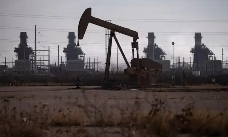 A pump jack operates near a gas turbine power plant in the Permian Basin oil field outside of Odessa, Texas, U.S. February 18, 2025. REUTERS A pump jack operates near a gas turbine power plant in the Permian Basin oil field outside of Odessa, Texas, U.S. February 18, 2025. REUTERS
