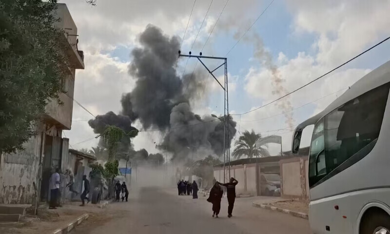 People run as plumes of smoke rise following an Israeli airstrike in Deir Al Balah, Gaza Strip, on Thursday. – Reuters People run as plumes of smoke rise following an Israeli airstrike in Deir Al Balah, Gaza Strip, on Thursday. – Reuters