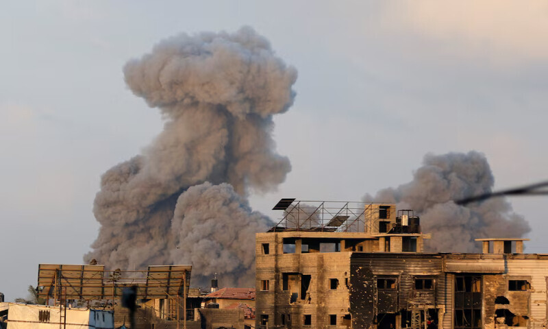 Smoke rises following an Israeli strike in Gaza City pn Thursday. – Reuters Smoke rises following an Israeli strike in Gaza City pn Thursday. – Reuters
