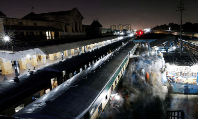 Passengers get on board a train at the Cantonment railway station in Karachi. Reuters file Passengers get on board a train at the Cantonment railway station in Karachi. Reuters file