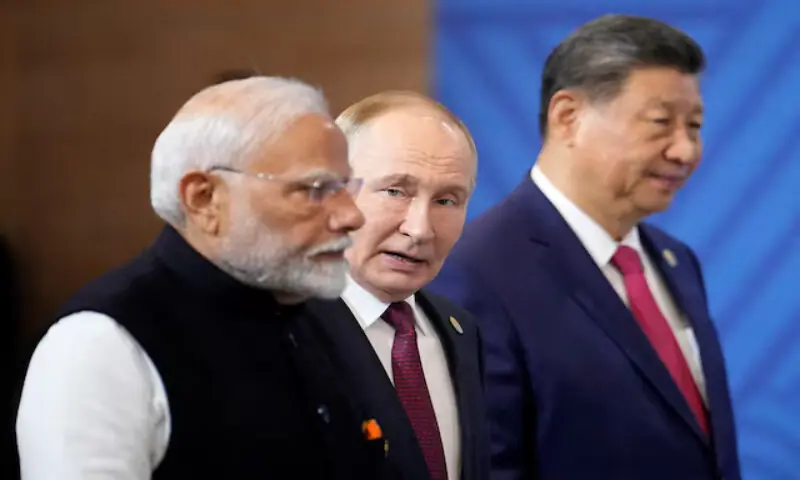 Indian Prime Minister Narendra Modi, Russian President Vladimir Putin and Chinese President Xi Jinping attend a family photo ceremony prior to the BRICS Summit plenary session in Kazan, Russia. – Reuters file Indian Prime Minister Narendra Modi, Russian President Vladimir Putin and Chinese President Xi Jinping attend a family photo ceremony prior to the BRICS Summit plenary session in Kazan, Russia. – Reuters file