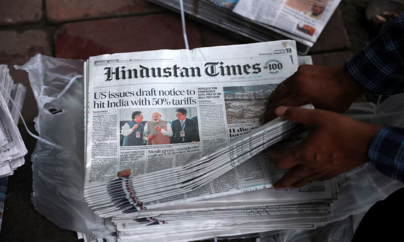 A hawker sorts copies of the latest edition of Hindustan Times, with the lead story on US tariffs on most Indian goods, in New Delhi, India, on Wednesday. – Reuters A hawker sorts copies of the latest edition of Hindustan Times, with the lead story on US tariffs on most Indian goods, in New Delhi, India, on Wednesday. – Reuters