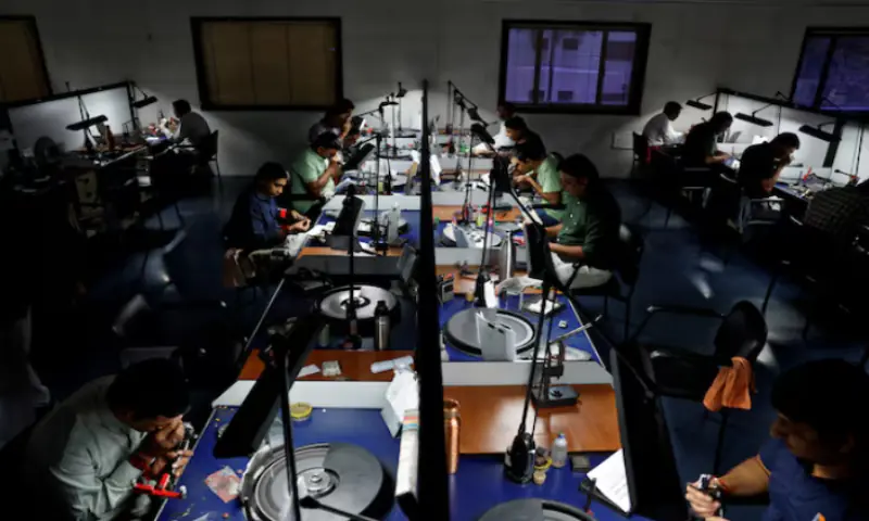 Craftsmen work on diamonds at a diamond processing unit in Surat, India, on August 15, 2025. Reuters file Craftsmen work on diamonds at a diamond processing unit in Surat, India, on August 15, 2025. Reuters file