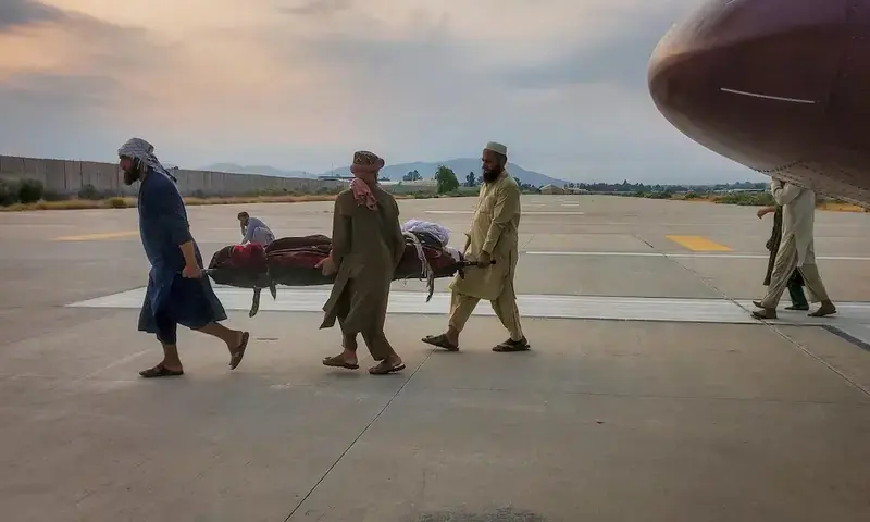 People carry an earthquake victim on a stretcher to an ambulance at an airport in Jalalabad, Afghanistan, on Monday. – Reuters People carry an earthquake victim on a stretcher to an ambulance at an airport in Jalalabad, Afghanistan, on Monday. – Reuters