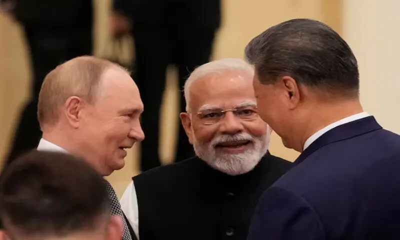 Indian Prime Minister Narendra Modi talks with Russian President Vladimir Putin and Chinese President Xi Jinping ahead of the Shanghai Cooperation Organisation (SCO) Summit 2025 at the Meijiang Convention and Exhibition Centre in Tianjin, China, on Monday. – Reuters