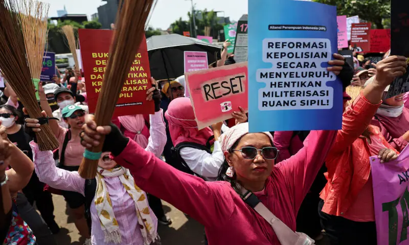 Women holding up brooms and placards attend a protest against lawmakers’ perks and police brutality outside the Indonesian parliament building in Jakarta, on Wednesday. – Reuters Women holding up brooms and placards attend a protest against lawmakers’ perks and police brutality outside the Indonesian parliament building in Jakarta, on Wednesday. – Reuters