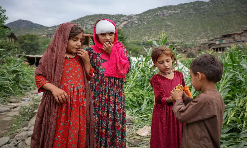 An injured Afghan girl stands with others after getting first aid following the deadly earthquake in Mazar Dara, Kunar province, Afghanistan. – Reuters An injured Afghan girl stands with others after getting first aid following the deadly earthquake in Mazar Dara, Kunar province, Afghanistan. – Reuters