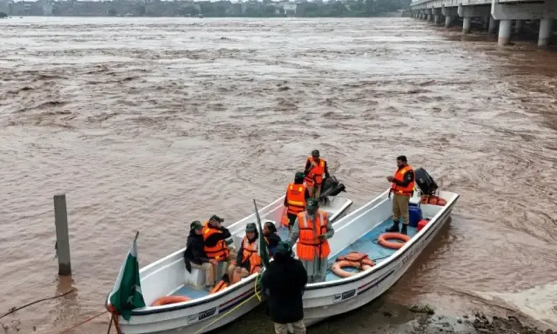 This aerial photograph shows rescue personnel preparing to patrol along the flooded Ravi river, following a rise in water levels near residential areas in Shahdara, Lahore on August 29, 2025. PHOTO: AFP This aerial photograph shows rescue personnel preparing to patrol along the flooded Ravi river, following a rise in water levels near residential areas in Shahdara, Lahore on August 29, 2025. PHOTO: AFP