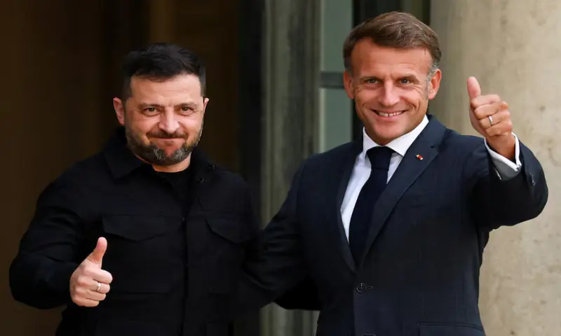 French President Emmanuel Macron and Ukraine’s President Volodymyr Zelenskiy gesture as they meet at the Elysee Palace, in Paris. Reuters French President Emmanuel Macron and Ukraine’s President Volodymyr Zelenskiy gesture as they meet at the Elysee Palace, in Paris. Reuters