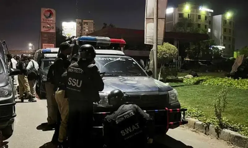A representational image shows police officers take positions after a police office building was attacked by gunmen in Karachi on February 17, 2023. Photo via Reuters A representational image shows police officers take positions after a police office building was attacked by gunmen in Karachi on February 17, 2023. Photo via Reuters