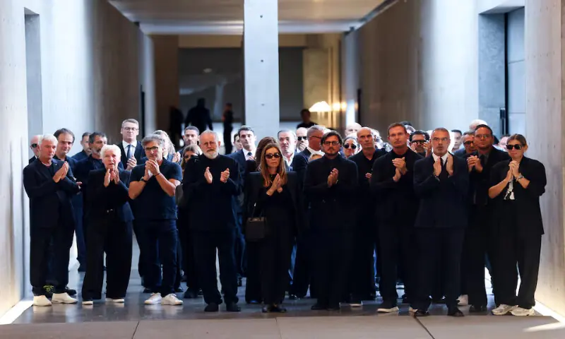 Mourners clap as a hearse carrying the coffin with the body of designer Giorgio Armani leaves the Armani/Teatro where he lay in state, following his death at the age of 91, in Milan, Italy. – Reuters Mourners clap as a hearse carrying the coffin with the body of designer Giorgio Armani leaves the Armani/Teatro where he lay in state, following his death at the age of 91, in Milan, Italy. – Reuters