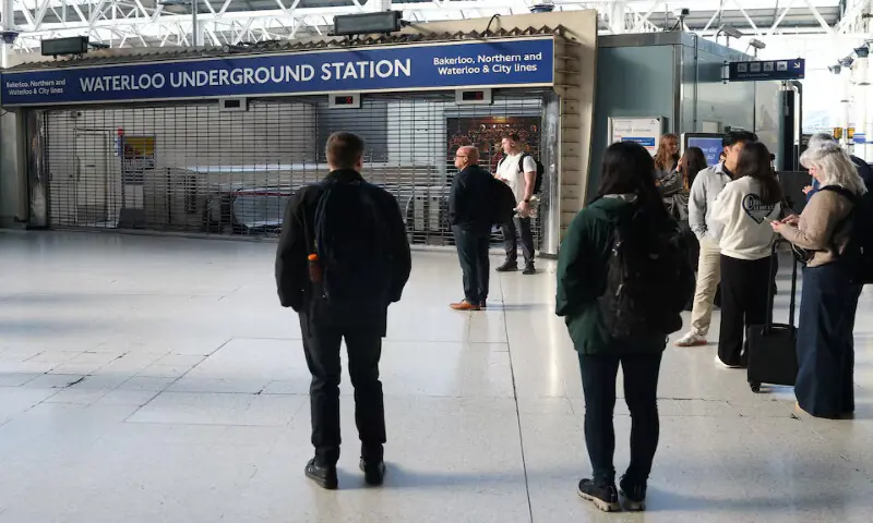 Travellers pause outside a closed London Underground entrance as tube rail strikes continue, during the morning rush hour at Waterloo Station in London, Britain, on Monday. – Reuters Travellers pause outside a closed London Underground entrance as tube rail strikes continue, during the morning rush hour at Waterloo Station in London, Britain, on Monday. – Reuters