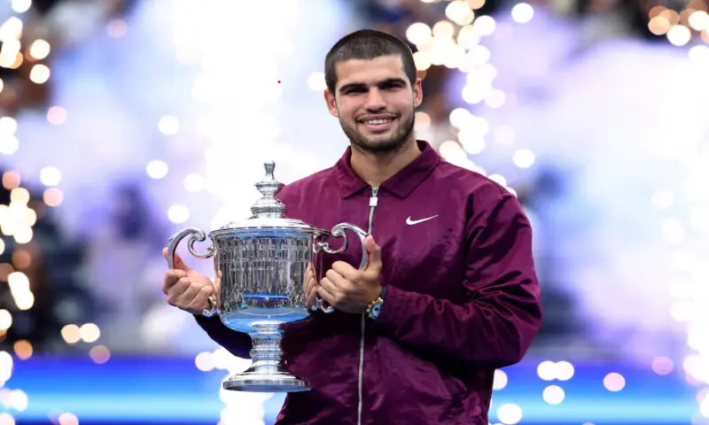 Tennis - U.S. Open - Flushing Meadows, New York, United States - September 7, 2025 Spain’s Carlos Alcaraz celebrates with the trophy after winning the men’s singles final REUTERS Tennis - U.S. Open - Flushing Meadows, New York, United States - September 7, 2025 Spain’s Carlos Alcaraz celebrates with the trophy after winning the men’s singles final REUTERS