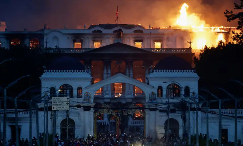 Flames rise from the burning Singha Durbar office complex that houses the Nepali prime minister’s office and other ministries, amid a protest against Monday’s killing of 19 people after anti-corruption protests that were triggered by a social media ban which was later lifted, during a curfew in Kathmandu, Nepal, September 9, 2025. REUTERS Flames rise from the burning Singha Durbar office complex that houses the Nepali prime minister’s office and other ministries, amid a protest against Monday’s killing of 19 people after anti-corruption protests that were triggered by a social media ban which was later lifted, during a curfew in Kathmandu, Nepal, September 9, 2025. REUTERS