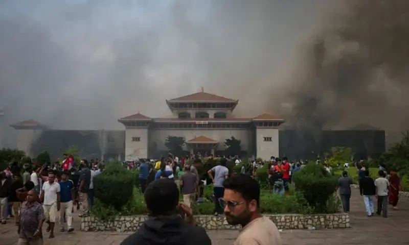Demonstrators gather as smoke rises from the Parliament complex following a fire set during a protest against Monday’s killing of 19 people after anti-corruption protests that were triggered by a social media ban, which was later lifted, during a curfew in Kathmandu, Nepal, September 9, 2025. Photo via Reuters Demonstrators gather as smoke rises from the Parliament complex following a fire set during a protest against Monday’s killing of 19 people after anti-corruption protests that were triggered by a social media ban, which was later lifted, during a curfew in Kathmandu, Nepal, September 9, 2025. Photo via Reuters